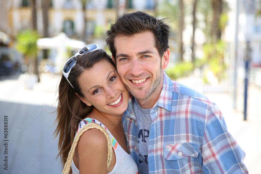 Portrait of cheerful couple in summer time Portrait of cheerful couple in summer time