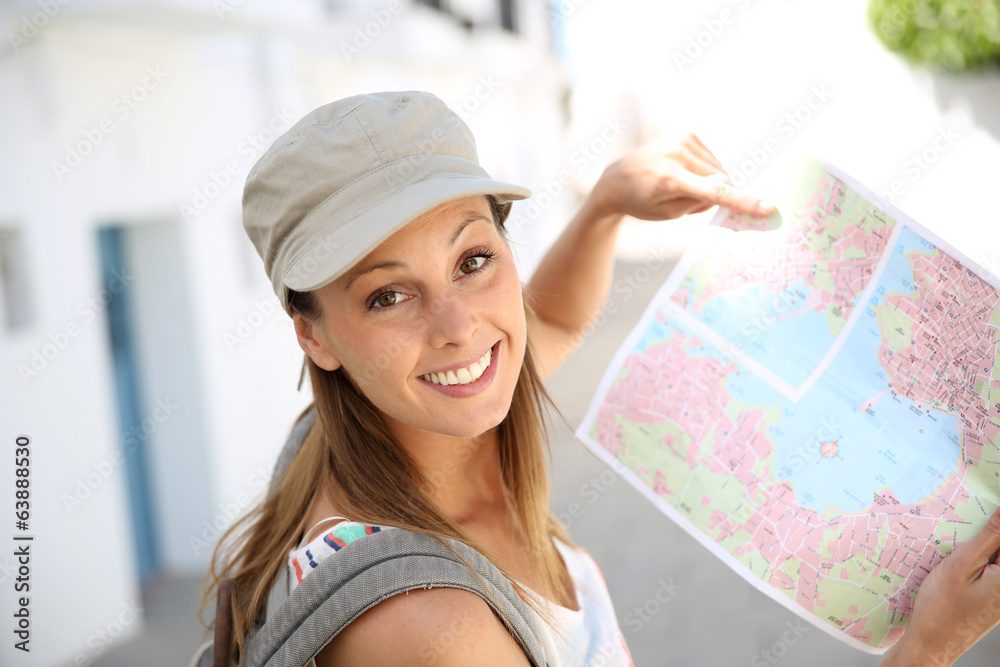 Tourist girl holding city map Tourist girl holding city map
