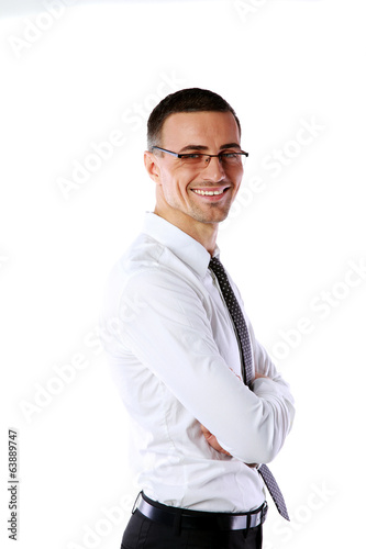 Portrait of a happy businessman with arms folded 