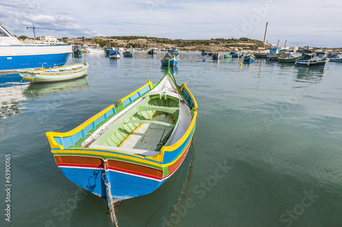Kajjik Boat at Marsaxlokk harbor in Malta.