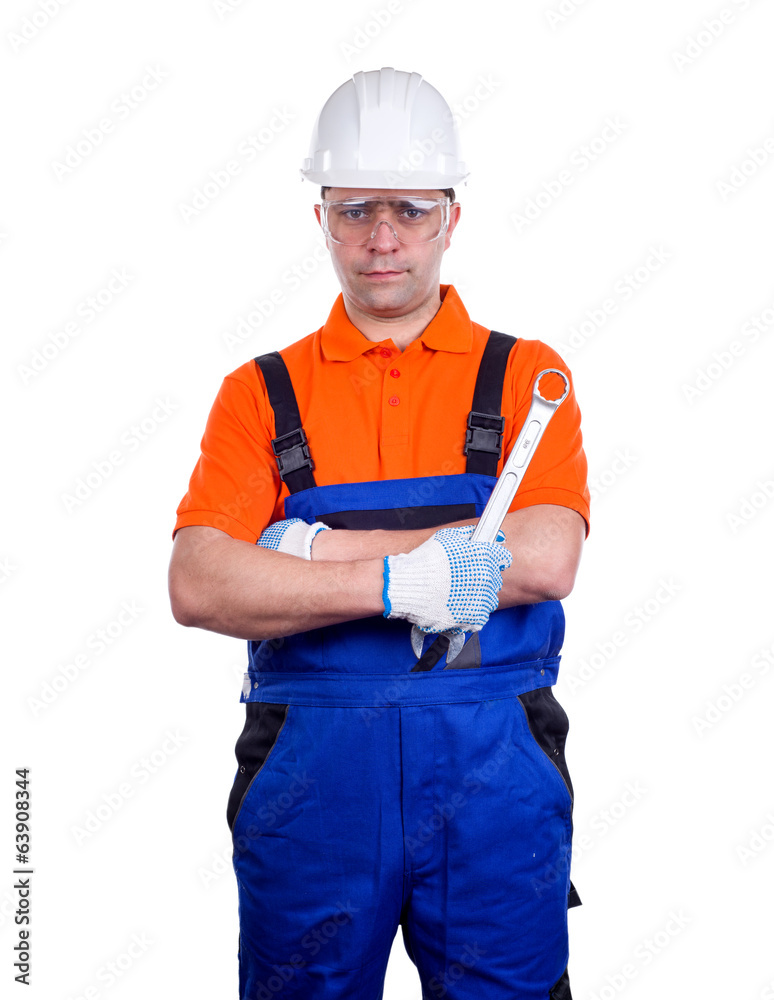 Worker in uniform with wrench isolated