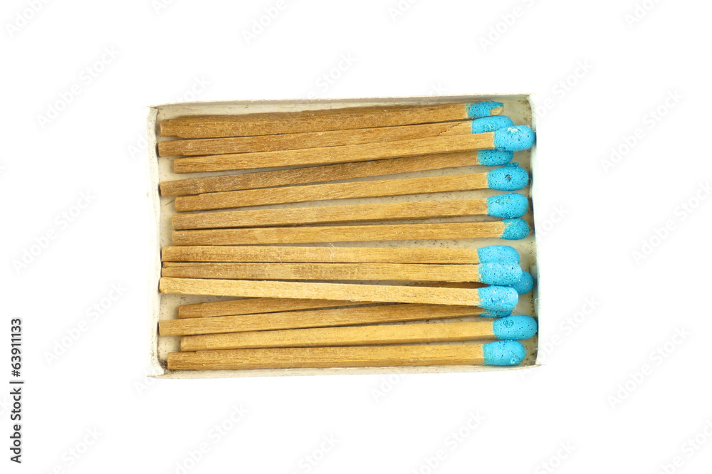 Blue matchstick in old box isolated