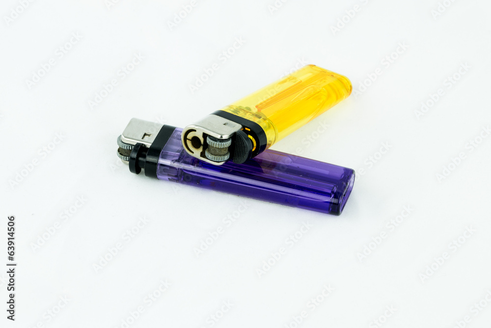 1 yellow lighter and 1 blue lighter on isolated background 1 yellow lighter and 1 blue lighter on isolated background