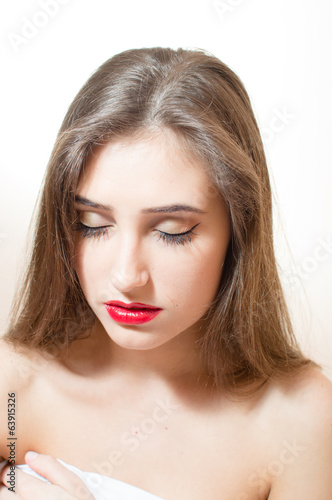 Charming brunette  woman with red lips