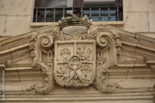 Escudo labrado en piedra, España photo