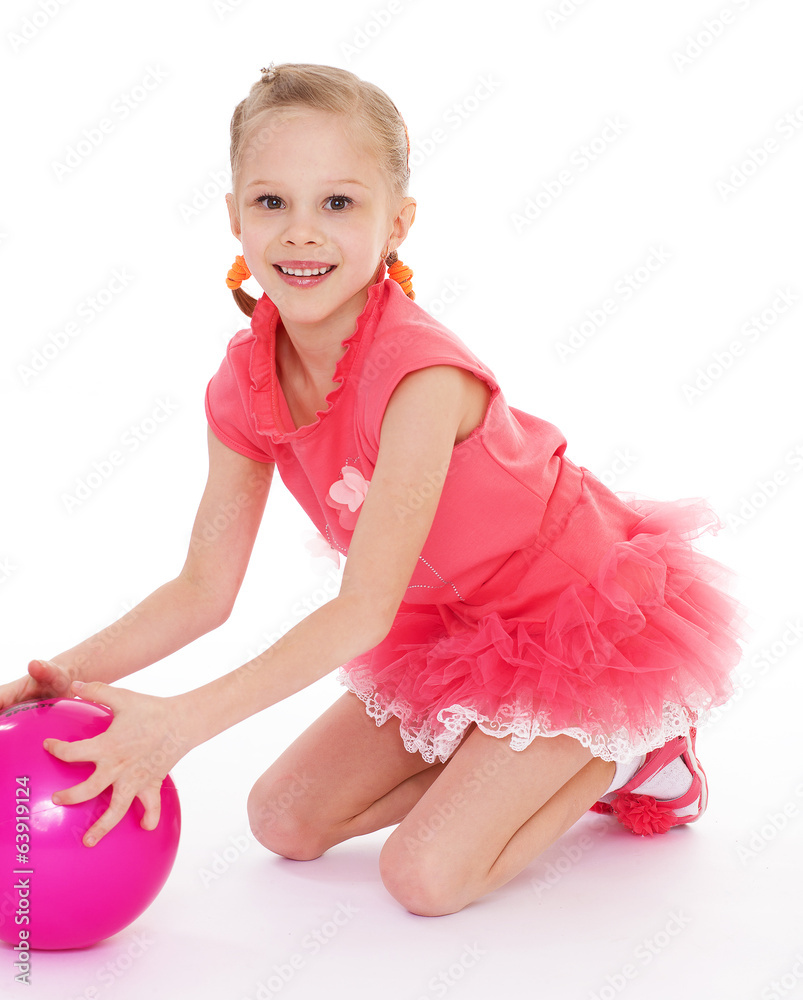 girl holding ball