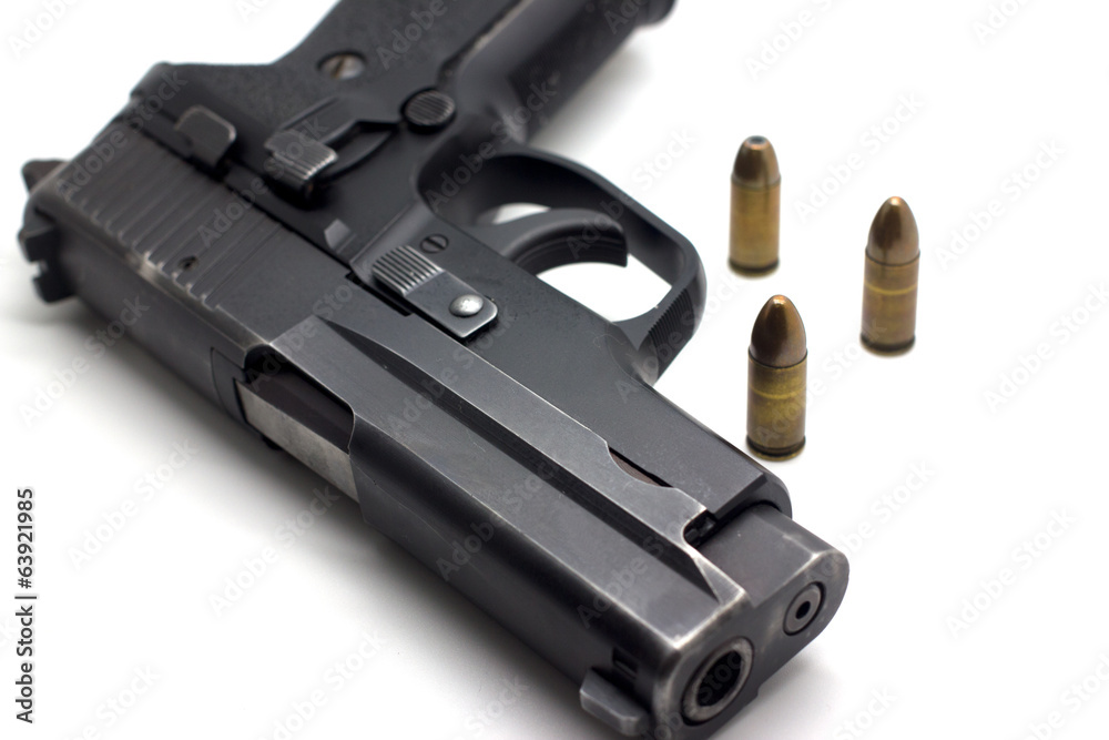 Gun with ammunition on white background Gun with ammunition on white background