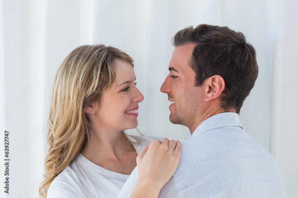 Loving young couple looking at each other Loving young couple looking at each other