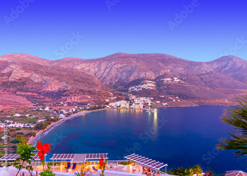 Aigiali Gulf and village by night in Amorgos island in Greece photo