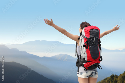 happy woman mountain hiker