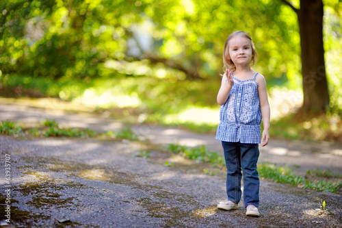 Adorable little girl outdoors