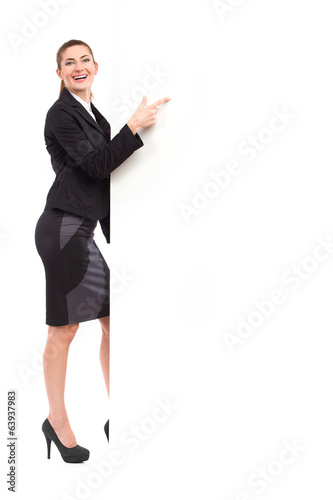 Businesswoman pointing at the big banner