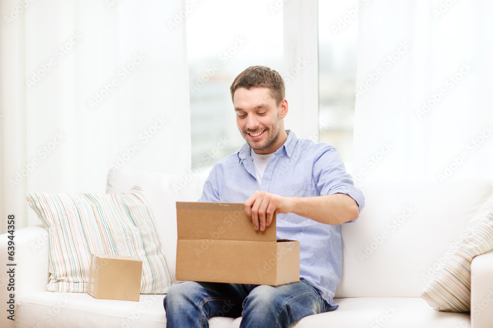 man with cardboard boxes at home man with cardboard boxes at home