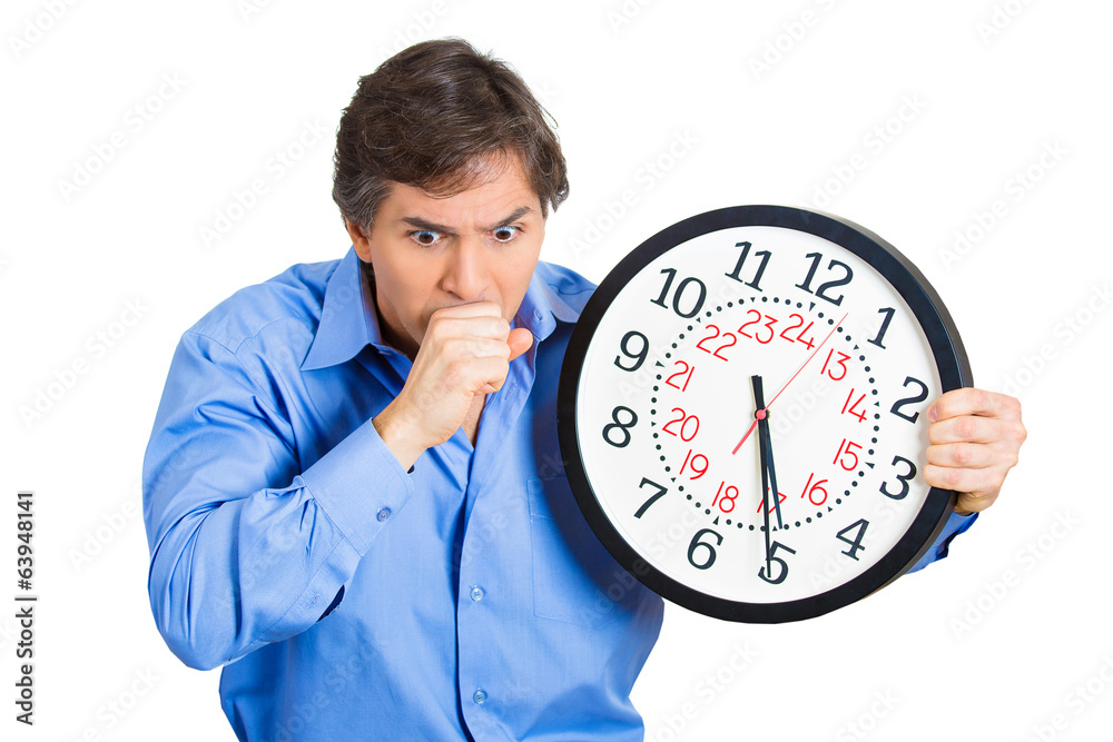 Time running out. Stressed business man holding clock Time running out. Stressed business man holding clock