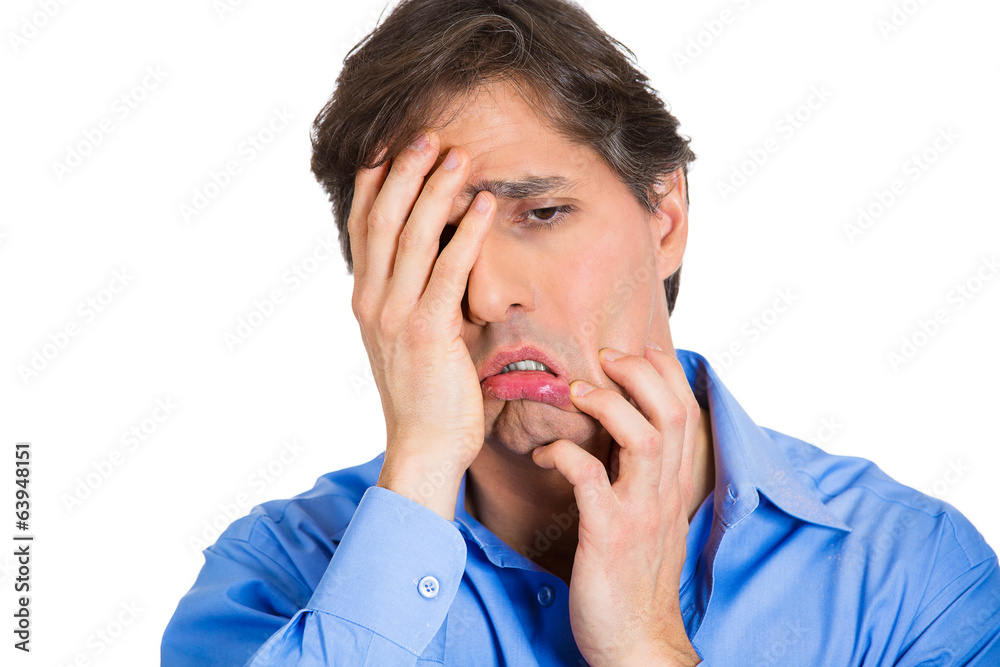 Miserable. Portrait of failed man, isolated on white background Miserable. Portrait of failed man, isolated on white background