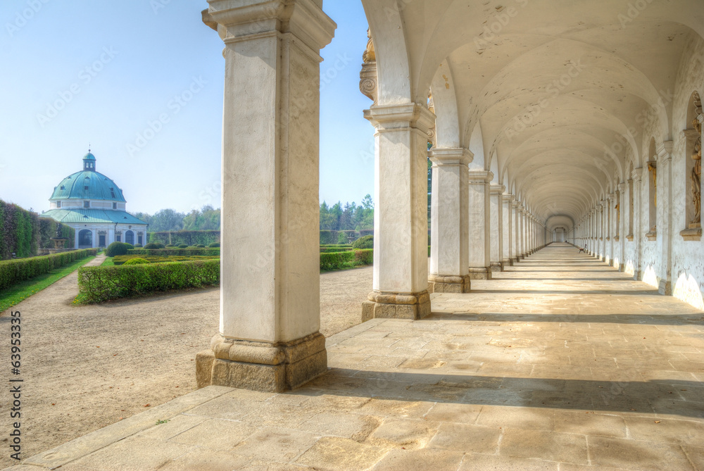 Long colonnade and baroque pavilion in city gardens