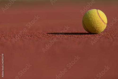 Tennis Ball on the Court Close up © Jale Ibrak
