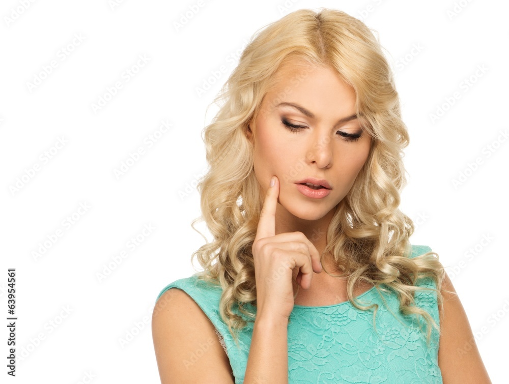Pensive young woman with long blond hair