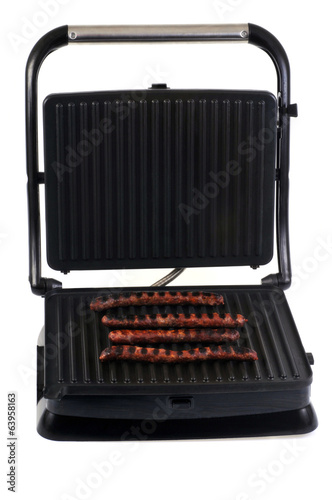 Merguez sur le grill électrique Stock Photo | Adobe Stock