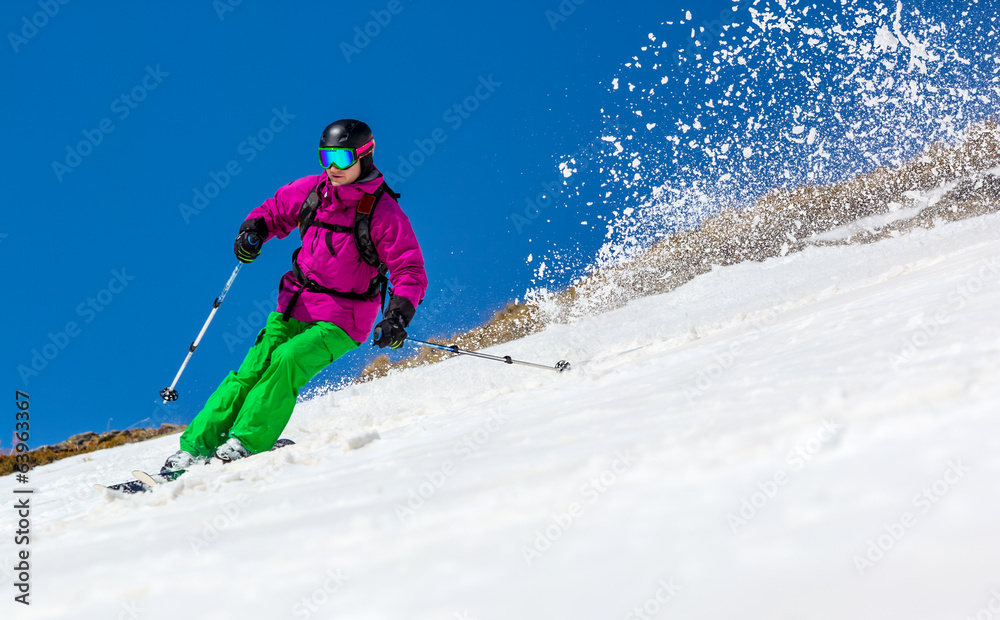 Man skier on a sky background