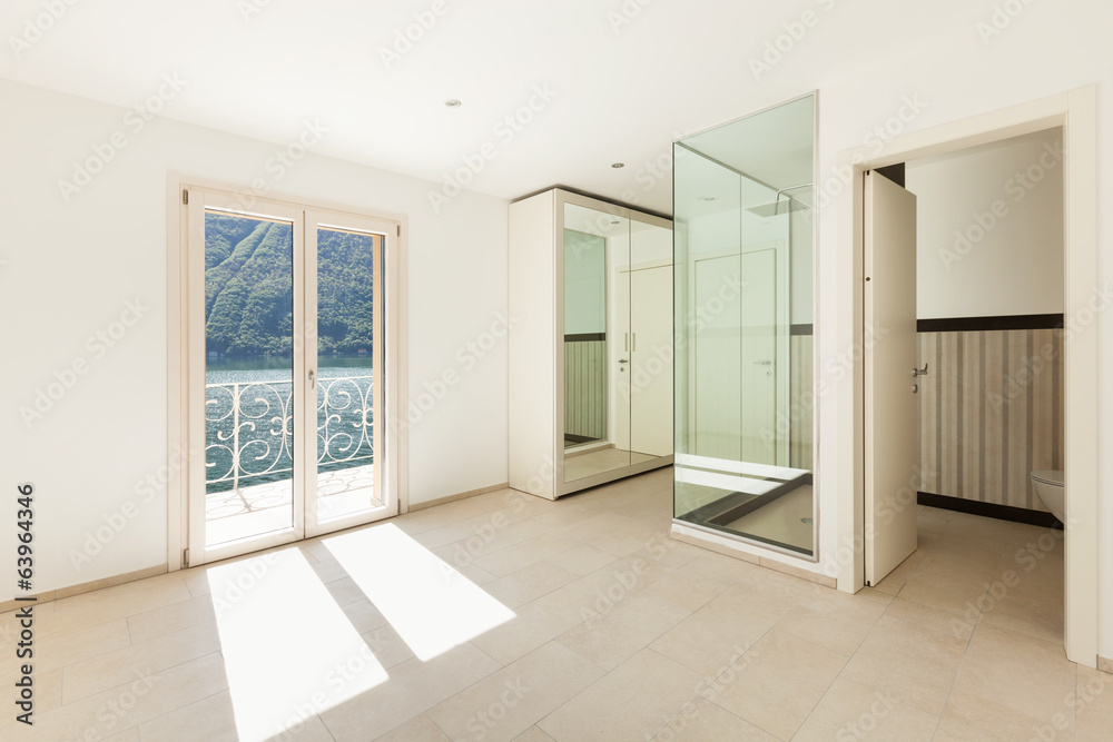 Interior of a new empty house, bathroom, shower view