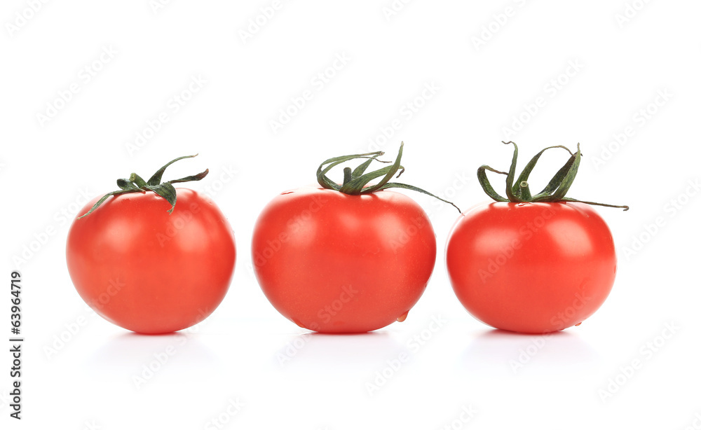 Three ripe tomatoes. Three ripe tomatoes.