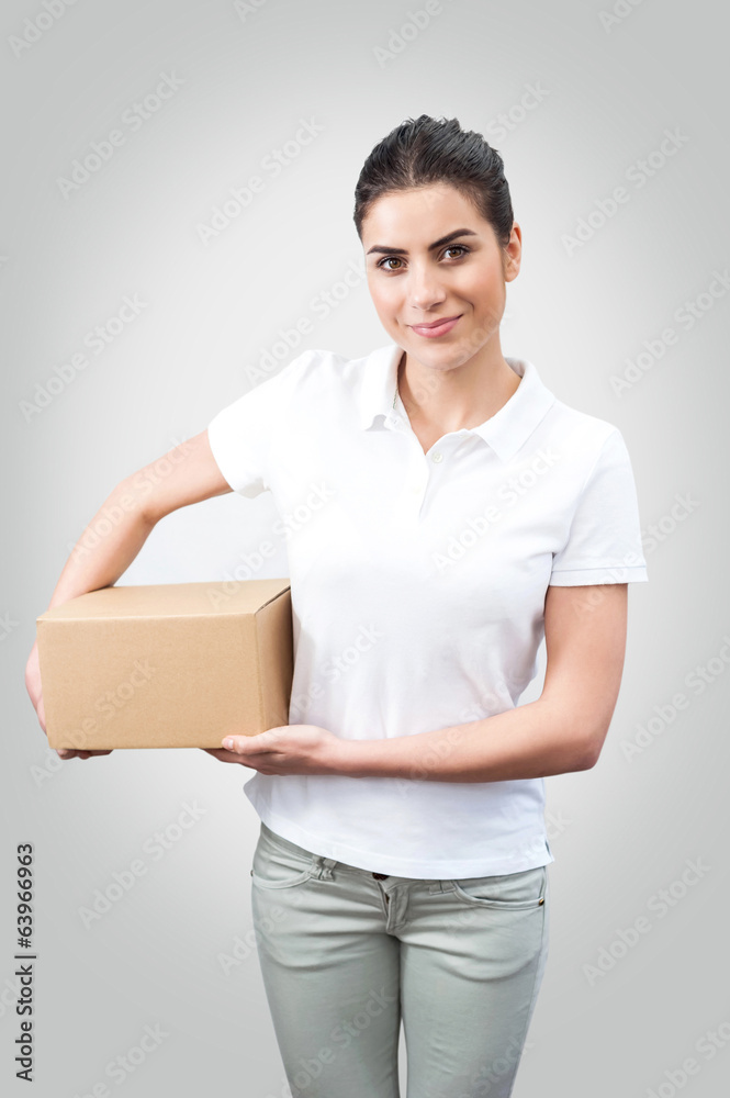 Delivery woman holding a box Delivery woman holding a box
