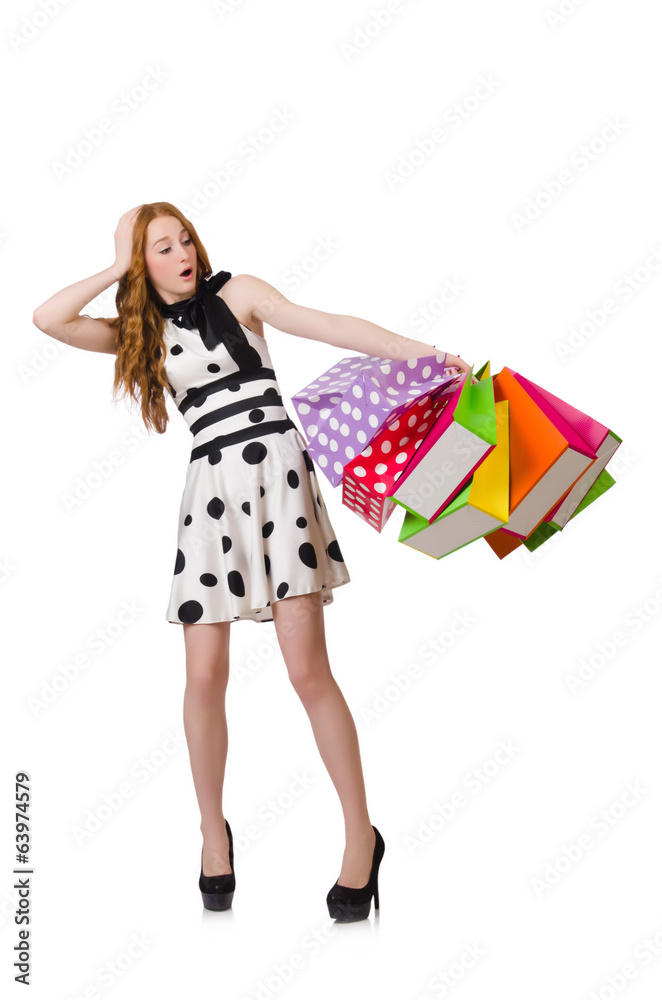 Young woman with shopping bags on white Young woman with shopping bags on white