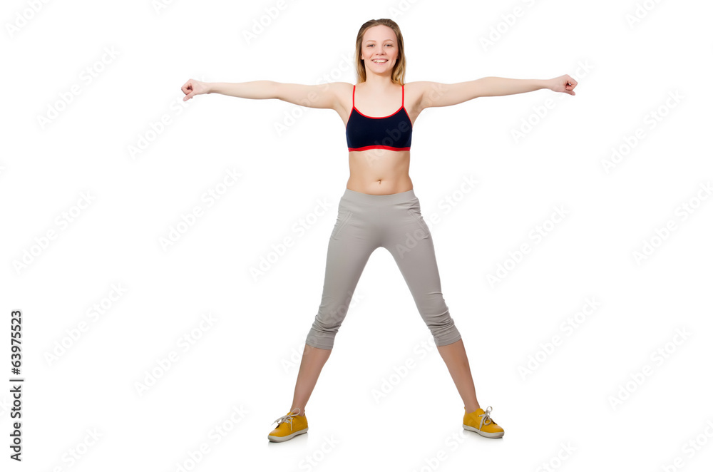 Young female doing exercises on white