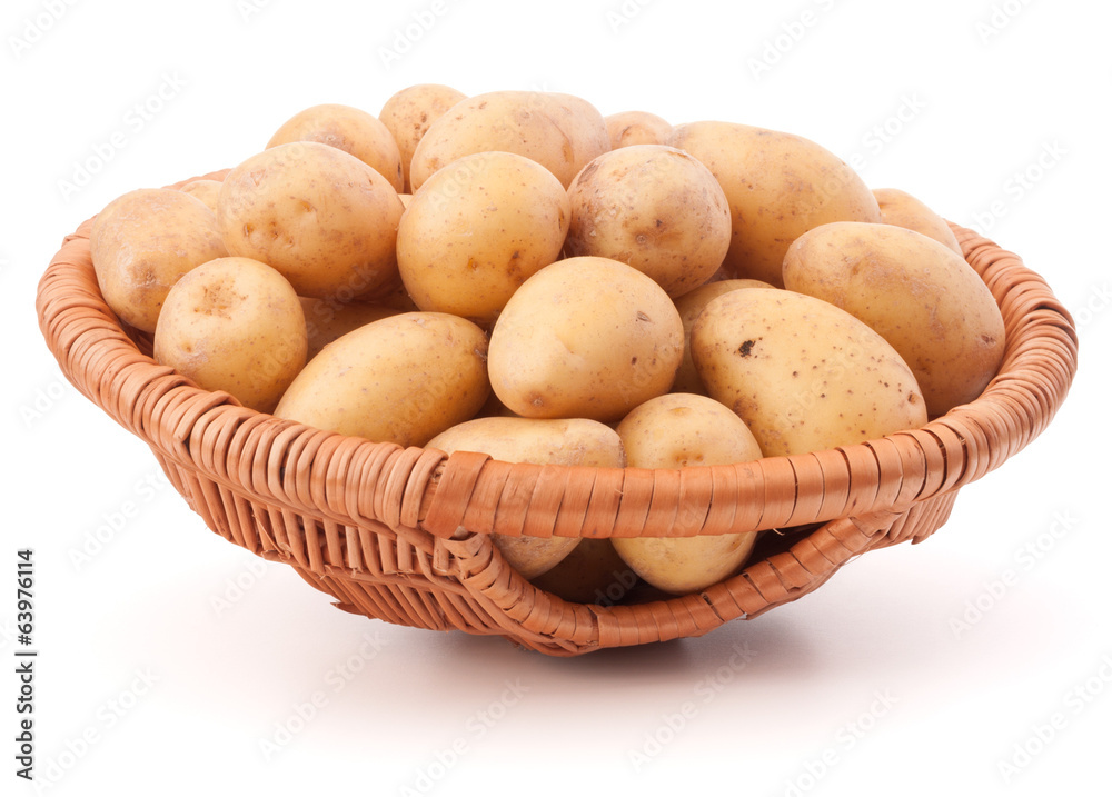 Potato tuber in wicker basket isolated on white background Potato tuber in wicker basket isolated on white background