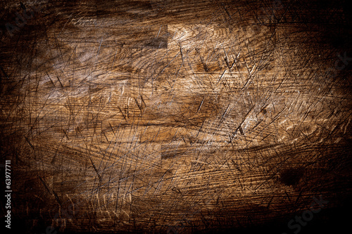 Background texture of old grungy scored wood