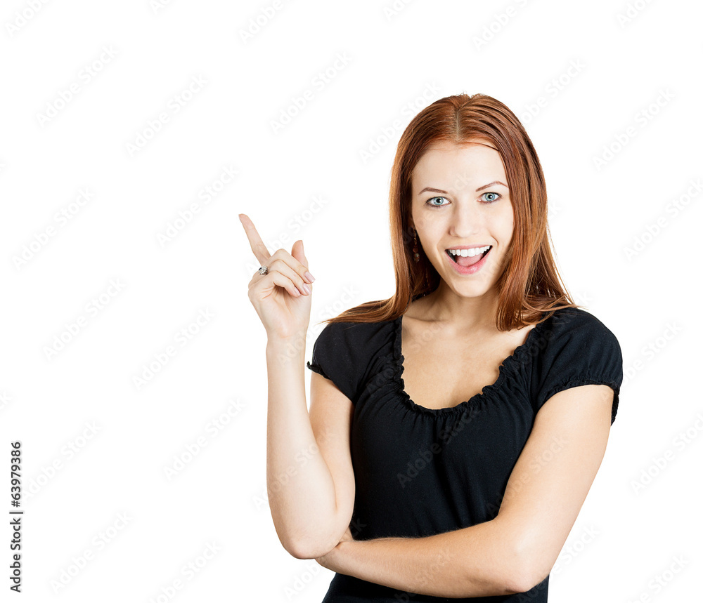 I have an idea happy woman pointing with finger at copy space I have an idea happy woman pointing with finger at copy space
