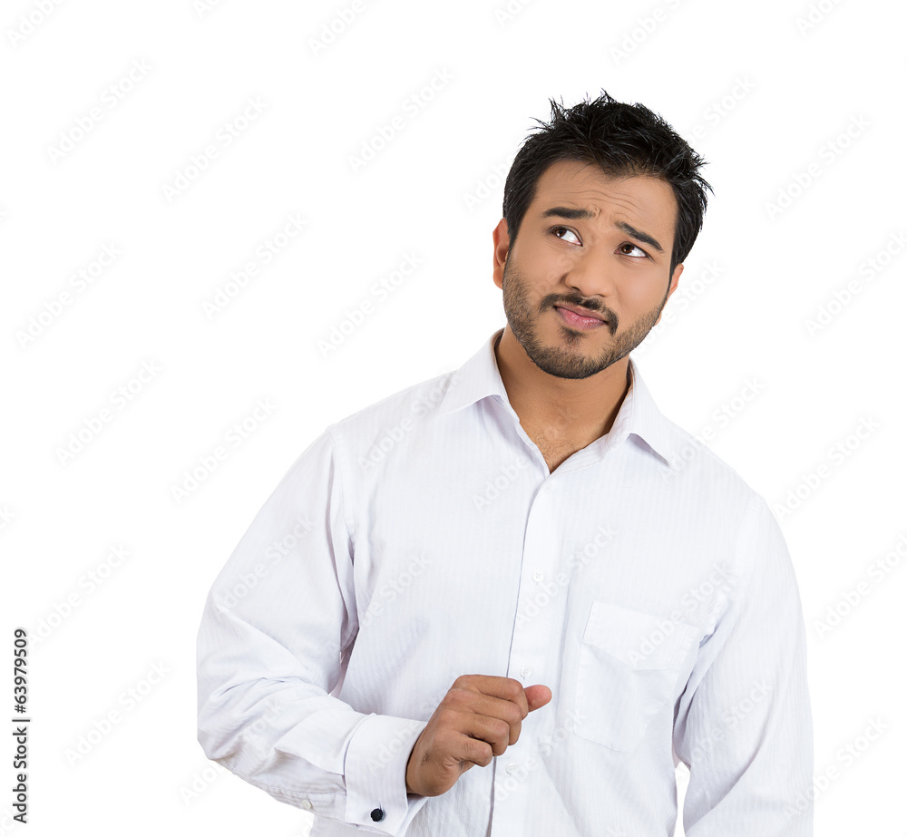Portrait worried puzzled concerned young man looking up