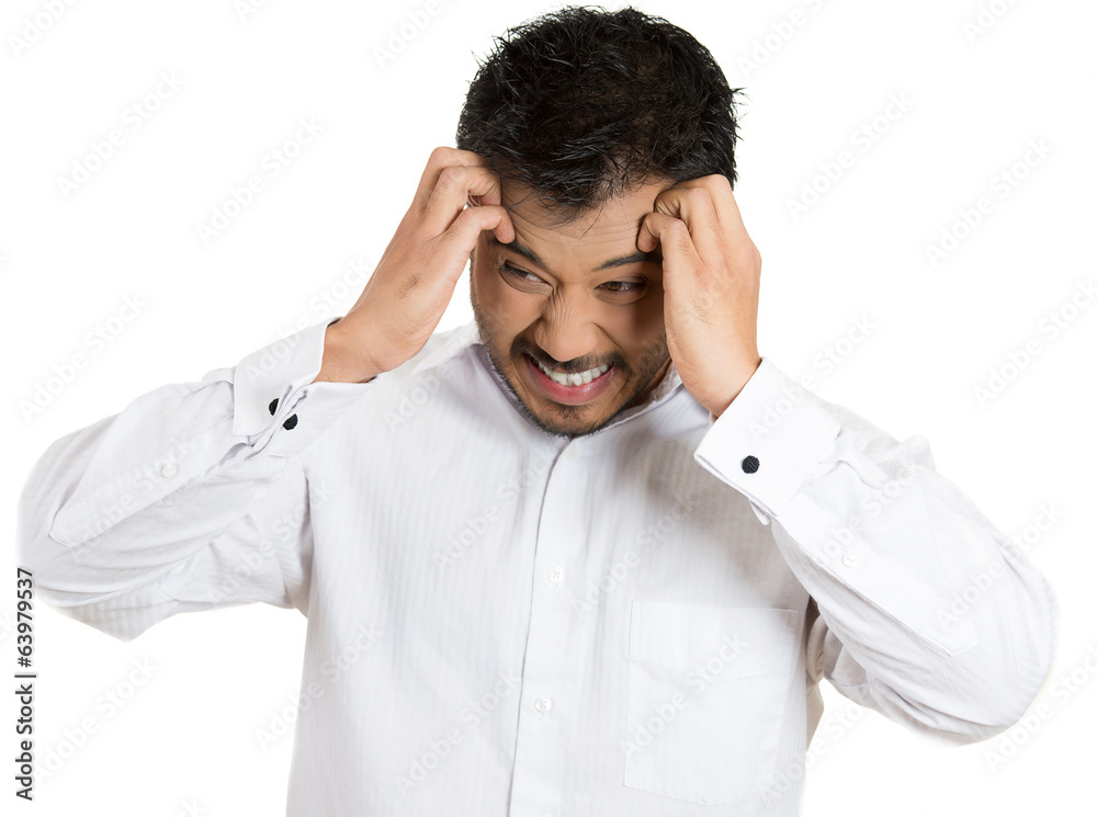 Headache, stress. Unhappy, upset business man Headache, stress. Unhappy, upset business man