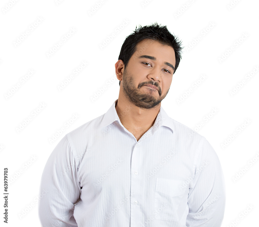 The skeptic. Cautious young business man questioning The skeptic. Cautious young business man questioning