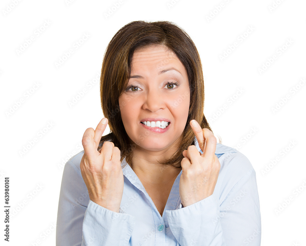 I wish. Middle aged woman crossing fingers full of expectation I wish. Middle aged woman crossing fingers full of expectation