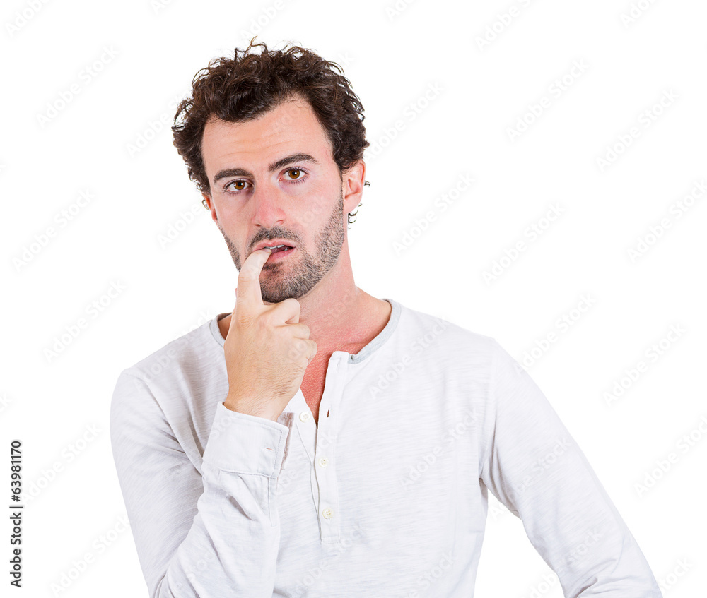 Portrait confused young man looking clueless on white background Portrait confused young man looking clueless on white background