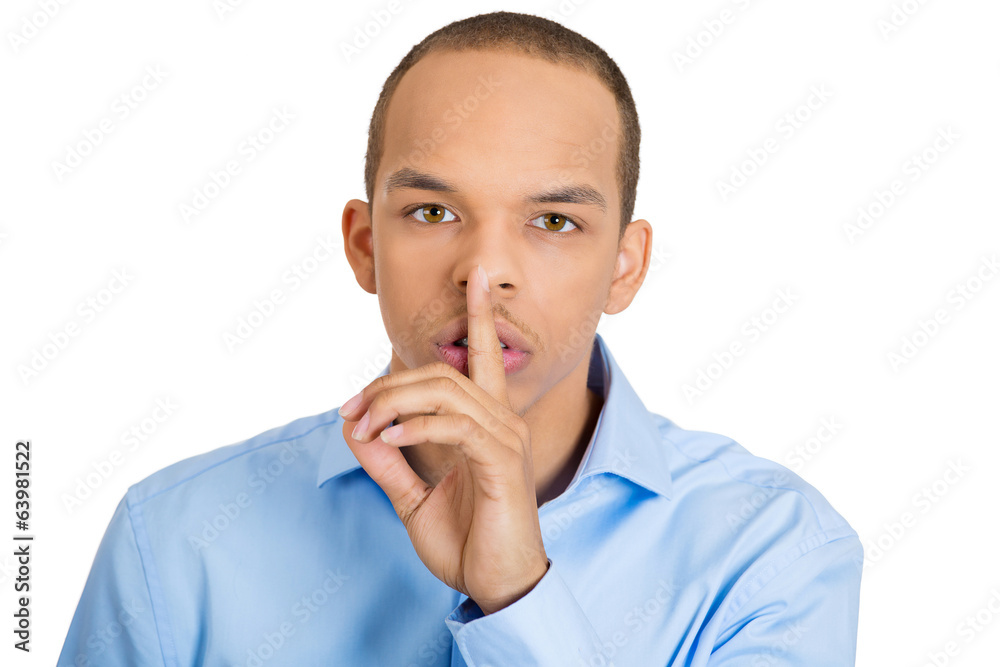 Shhh. Young business man asking to be quiet Shhh. Young business man asking to be quiet
