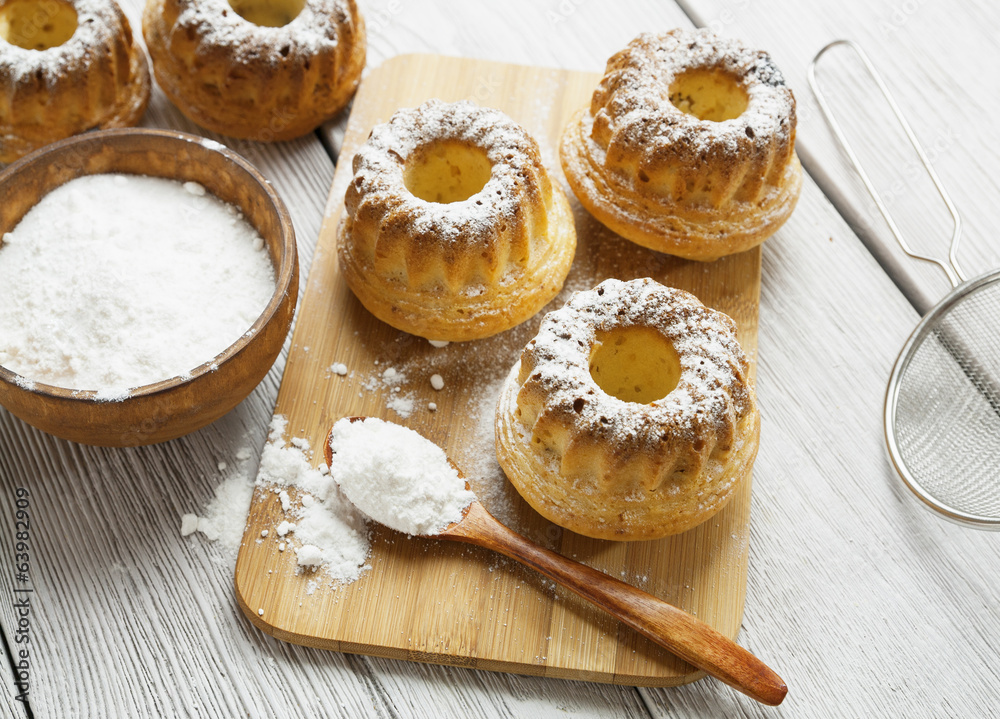 Homemade muffins powdered sugar