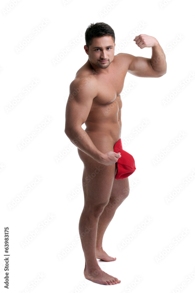 Shot of handsome naked man posing at camera