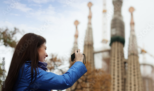 Photography Female tourist   photographing  Sagrada Familia at Barcelona