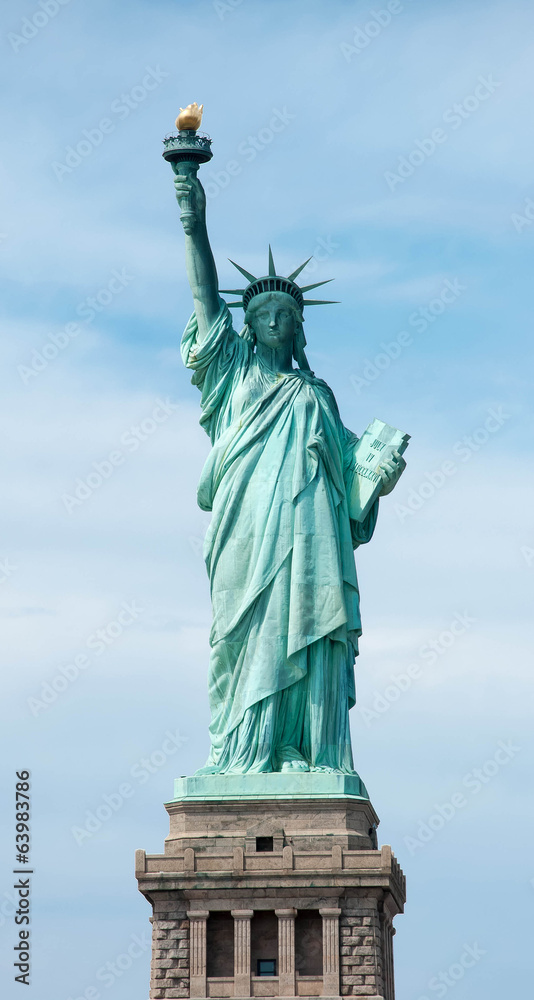 Fototapeta premium Statue of Liberty against the blue sky