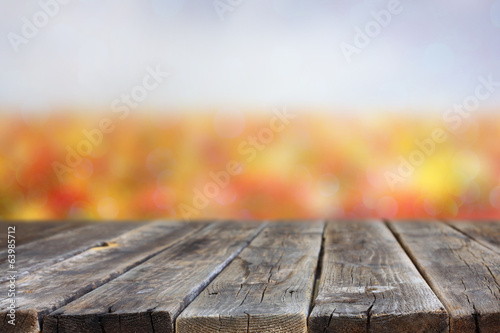 wood board and flower field background