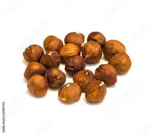 Heap of hazelnuts .