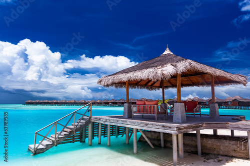 Boat jetty with steps on a tropical island of Maldives