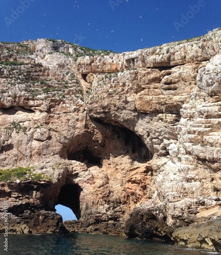 cliff at foradada island, alghero, sardinia, italy photo