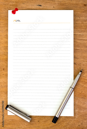 Canvas Print blank paper and pen on wooden bords