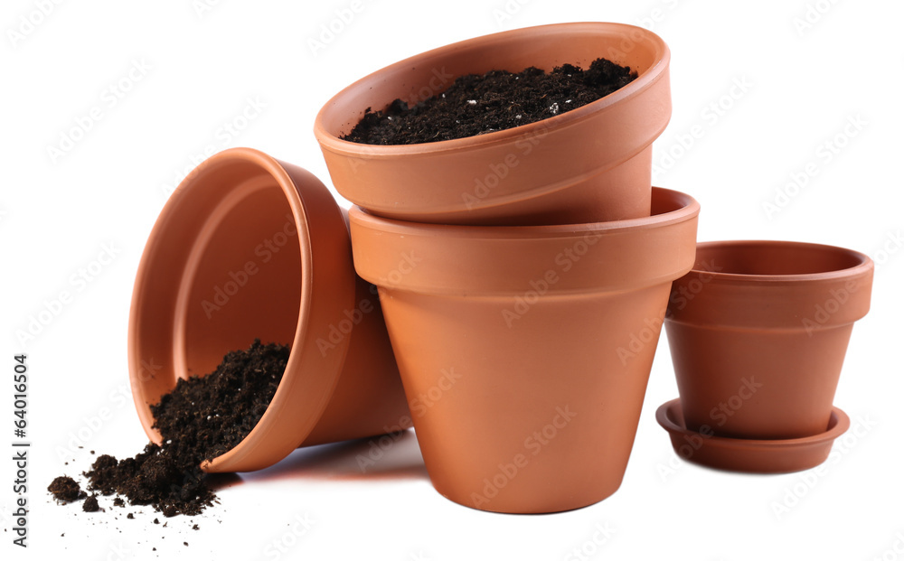 Clay flower pots and soil, isolated on white Clay flower pots and soil, isolated on white