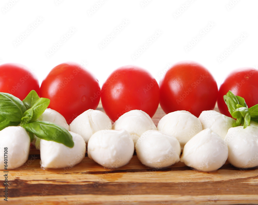 Tasty mozzarella cheese balls with basil and red tomatoes, Tasty mozzarella cheese balls with basil and red tomatoes,