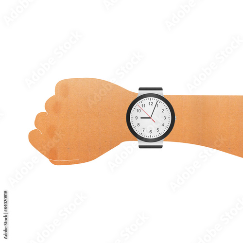 paper cut of wristwatch on hand wrist for checking to time in bu